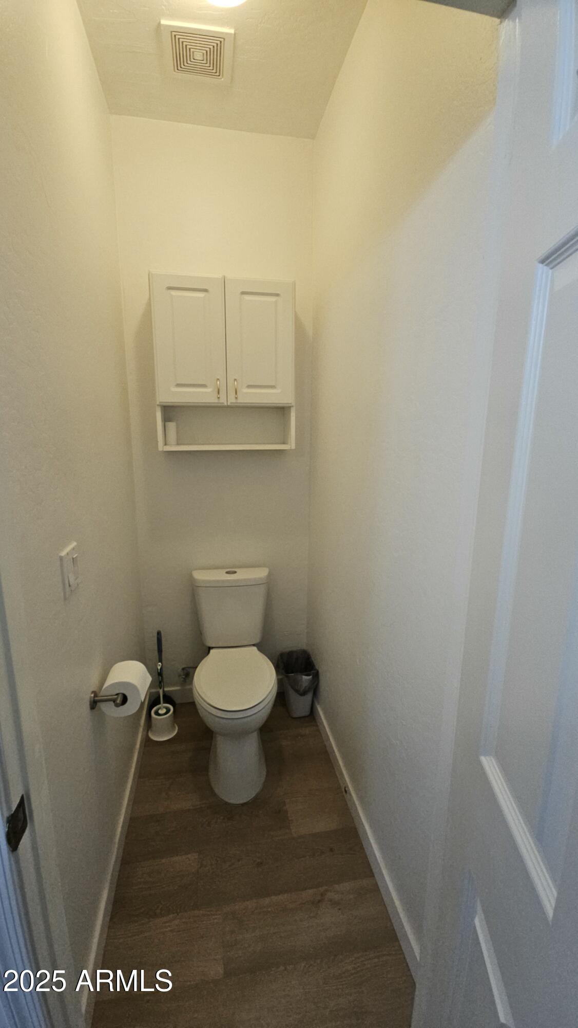 33340 West Lower Buckeye Road Tonopah, AZ 85354 - Photo 28 of 28 a bathroom with a toilet and a mirror