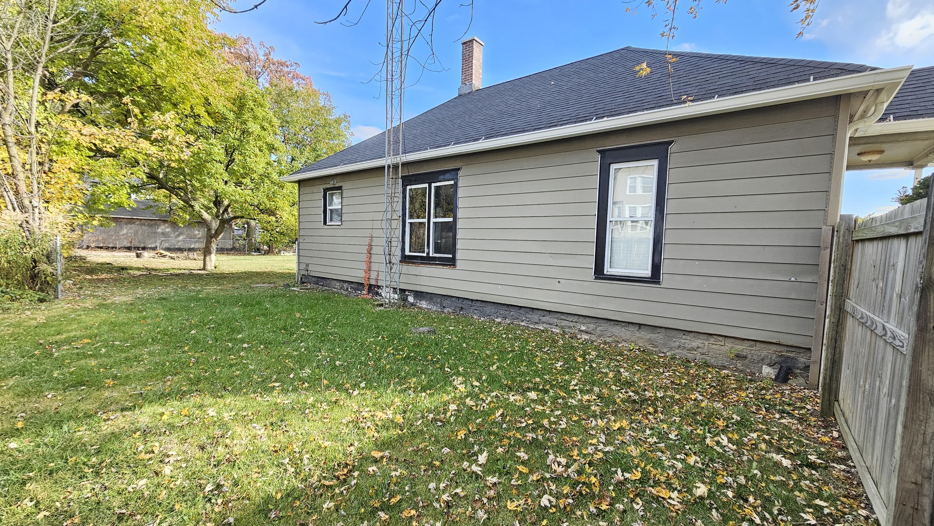 426 North Hebbard Street Joliet, IL 60432 - Photo 11 of 42 a backyard of a house with lots of green space
