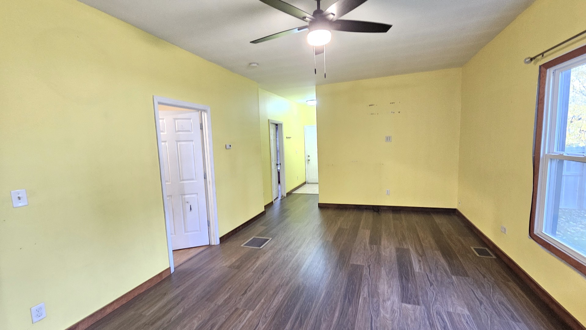 426 North Hebbard Street Joliet, IL 60432 - Photo 14 of 42 a view of an empty room with wooden floor