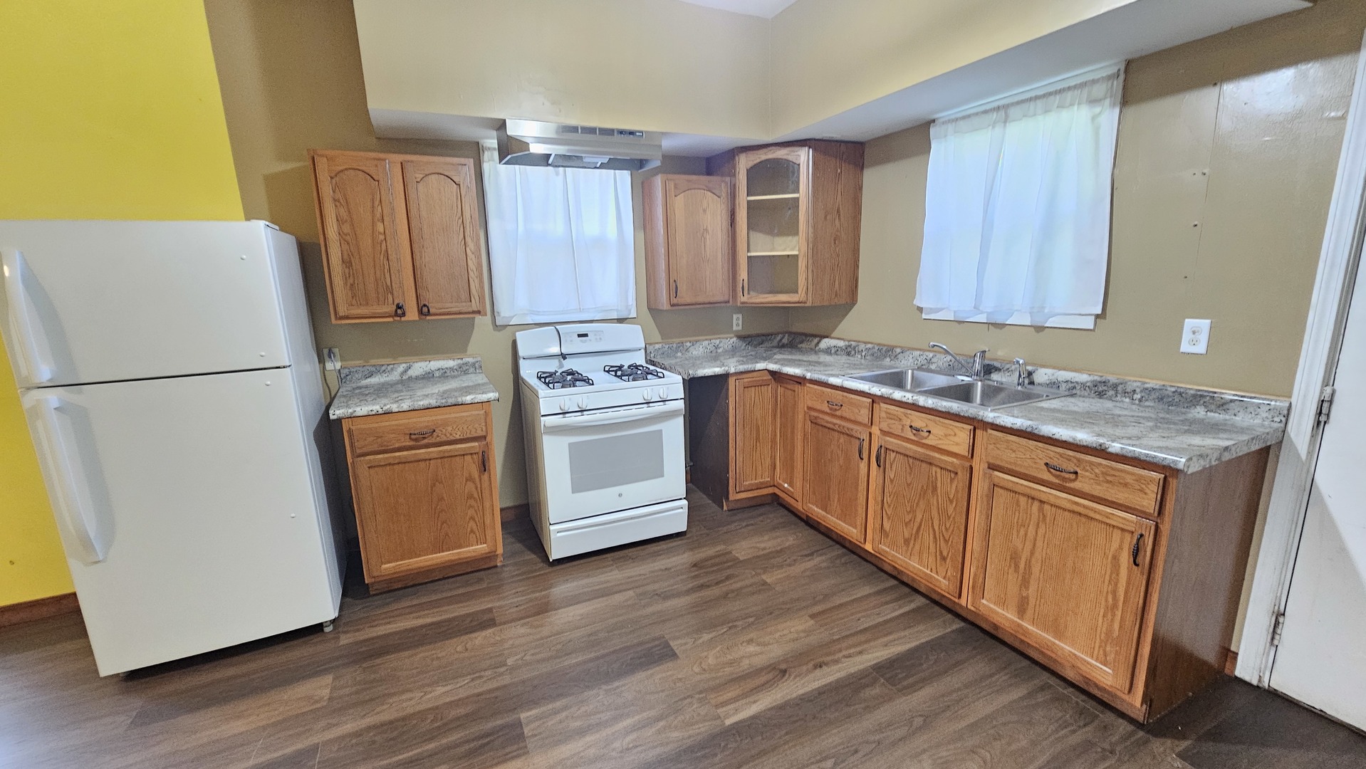 426 North Hebbard Street Joliet, IL 60432 - Photo 18 of 42 a kitchen with stainless steel appliances granite countertop a refrigerator a stove a sink and a hard wood floors