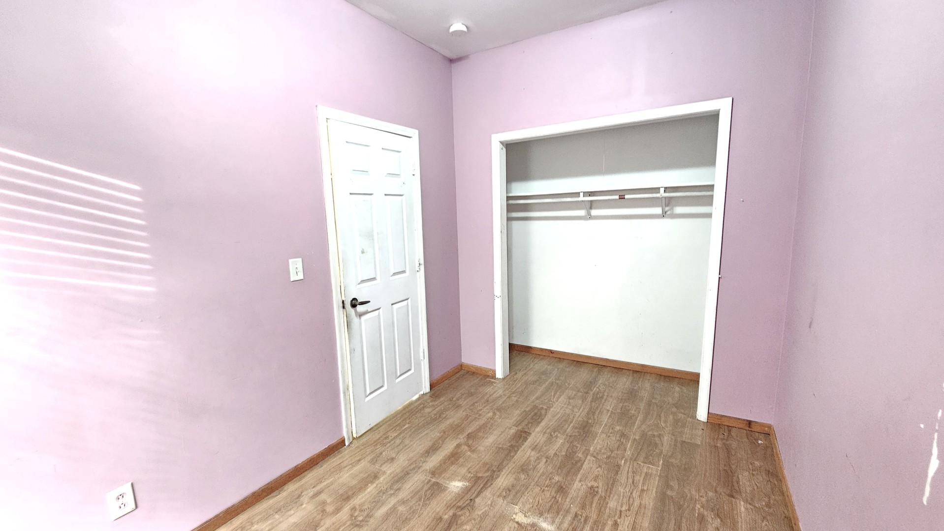 426 North Hebbard Street Joliet, IL 60432 - Photo 28 of 42 a view of a hallway with wooden floor