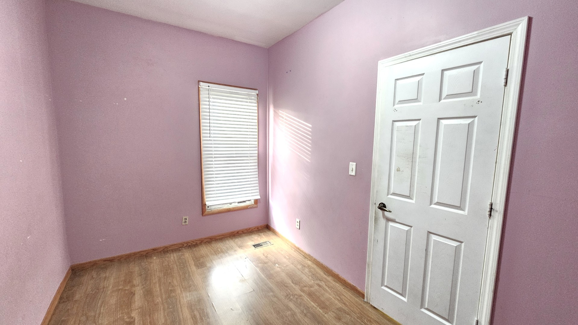 426 North Hebbard Street Joliet, IL 60432 - Photo 29 of 42 wooden floor in an empty room with a window