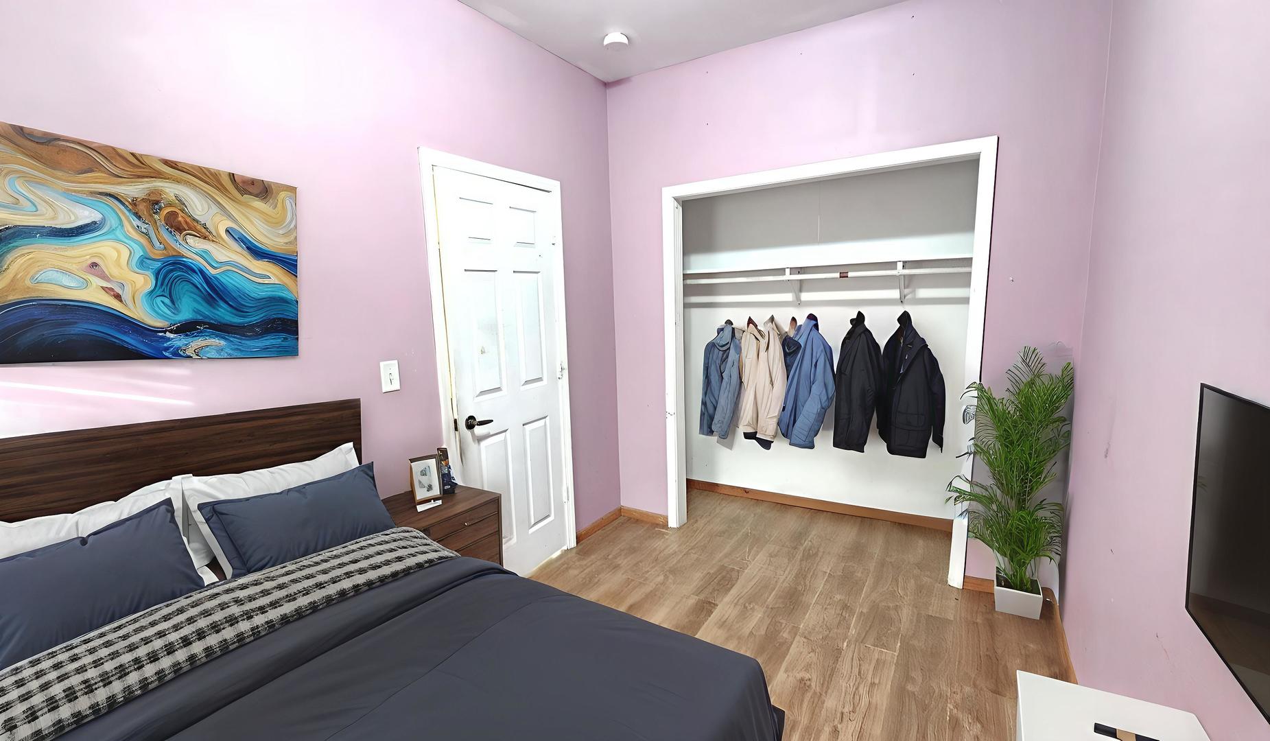 426 North Hebbard Street Joliet, IL 60432 - Photo 30 of 42 a view of a bedroom with furniture and wooden floor