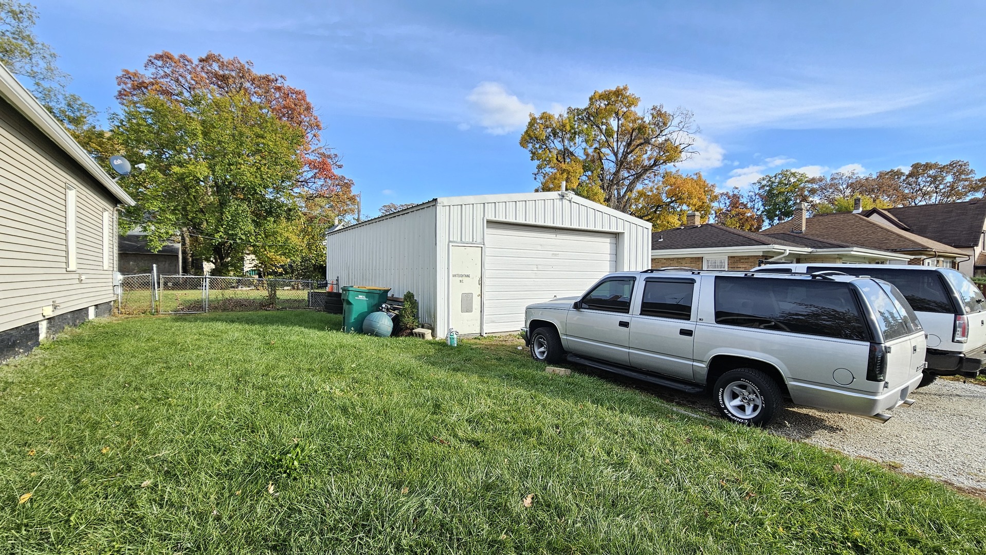 426 North Hebbard Street Joliet, IL 60432 - Photo 4 of 42 a car parked in front of a house