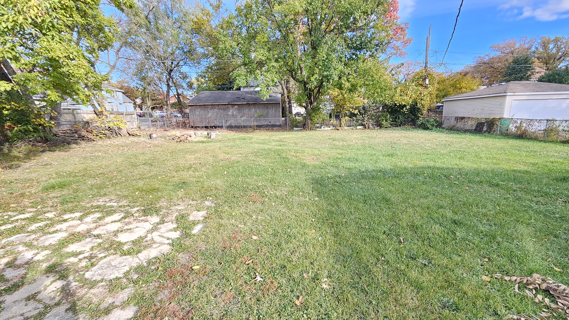 426 North Hebbard Street Joliet, IL 60432 - Photo 7 of 42 a view of a house with a yard and sitting area