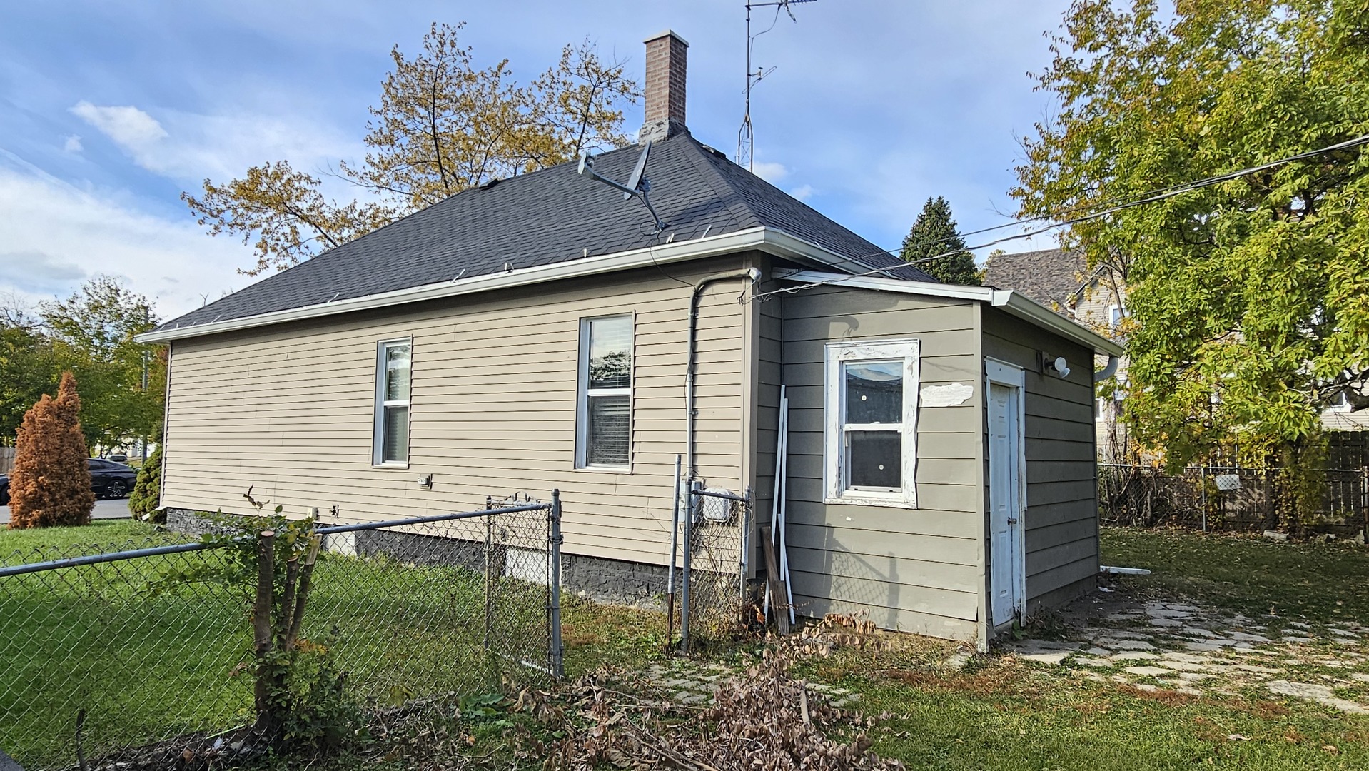 426 North Hebbard Street Joliet, IL 60432 - Photo 9 of 42 a view of a house with a yard