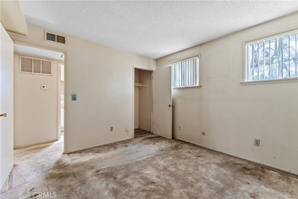 4641 Arlington Avenue Riverside, CA 92504 - Photo 11 of 33 a view of an empty room with a window