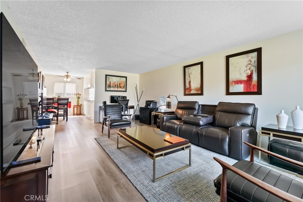 4641 Arlington Avenue Riverside, CA 92504 - Photo 13 of 33 a living room with furniture kitchen view and a window