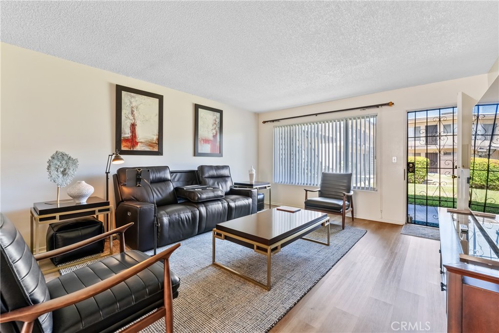 4641 Arlington Avenue Riverside, CA 92504 - Photo 15 of 33 a living room with furniture and a window