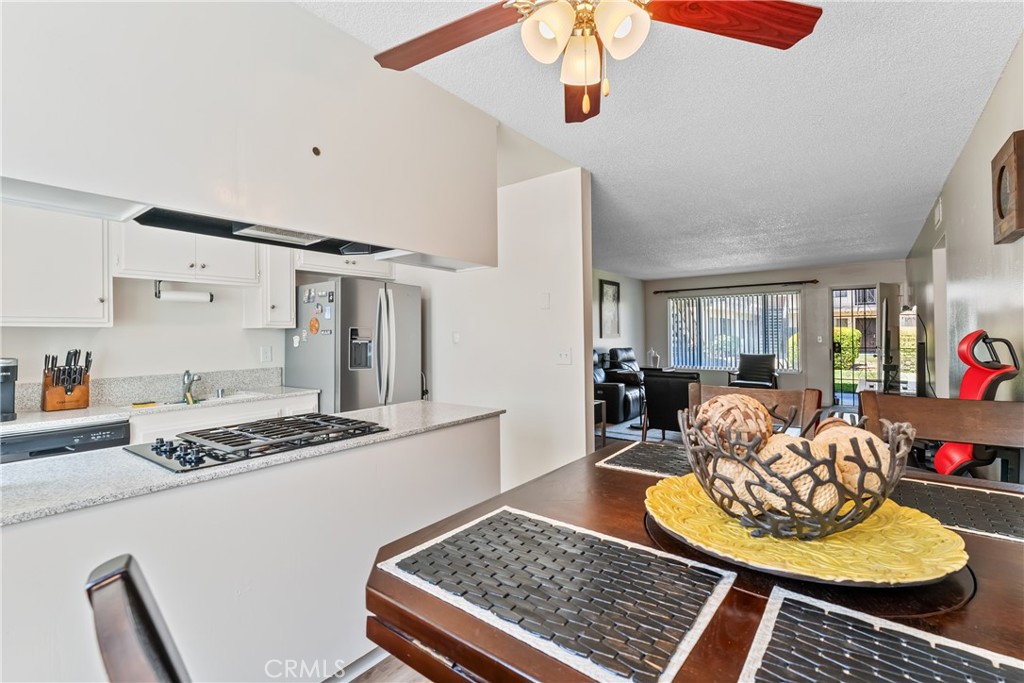 4641 Arlington Avenue Riverside, CA 92504 - Photo 18 of 33 a living room with furniture and a table
