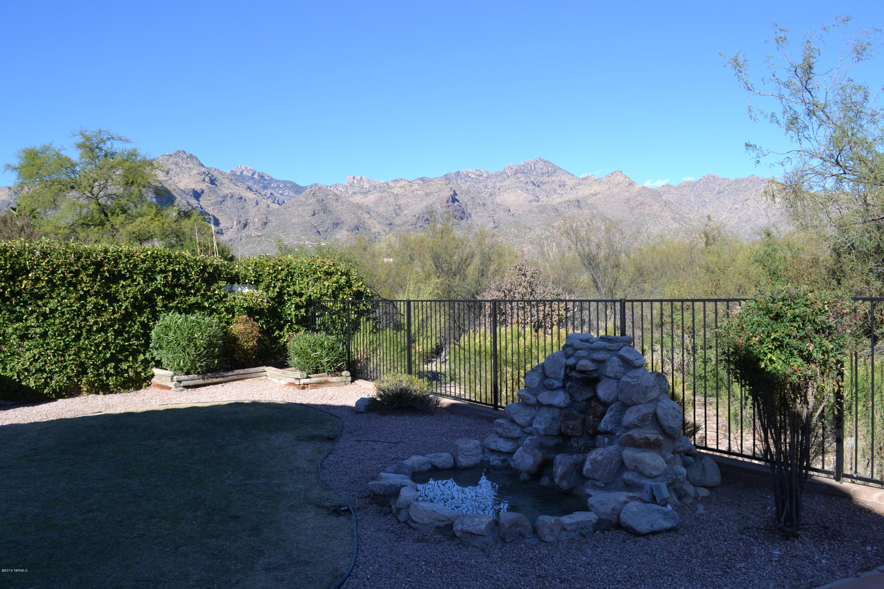 5640 North Cherokee Ridge Road Tucson, AZ 85750 - Photo 21 of 39 a view of a large body of water with a mountain
