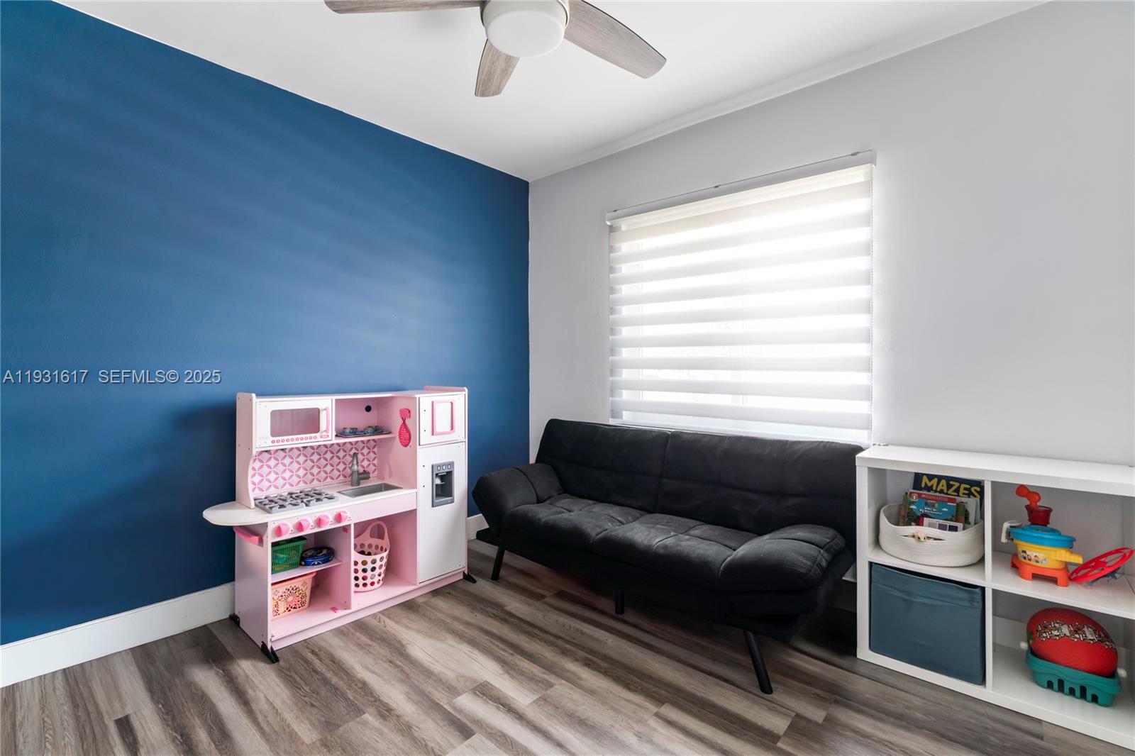 9612 Wyoming Court Boca Raton, FL 33434 - Photo 17 of 44 a living room with furniture and a window