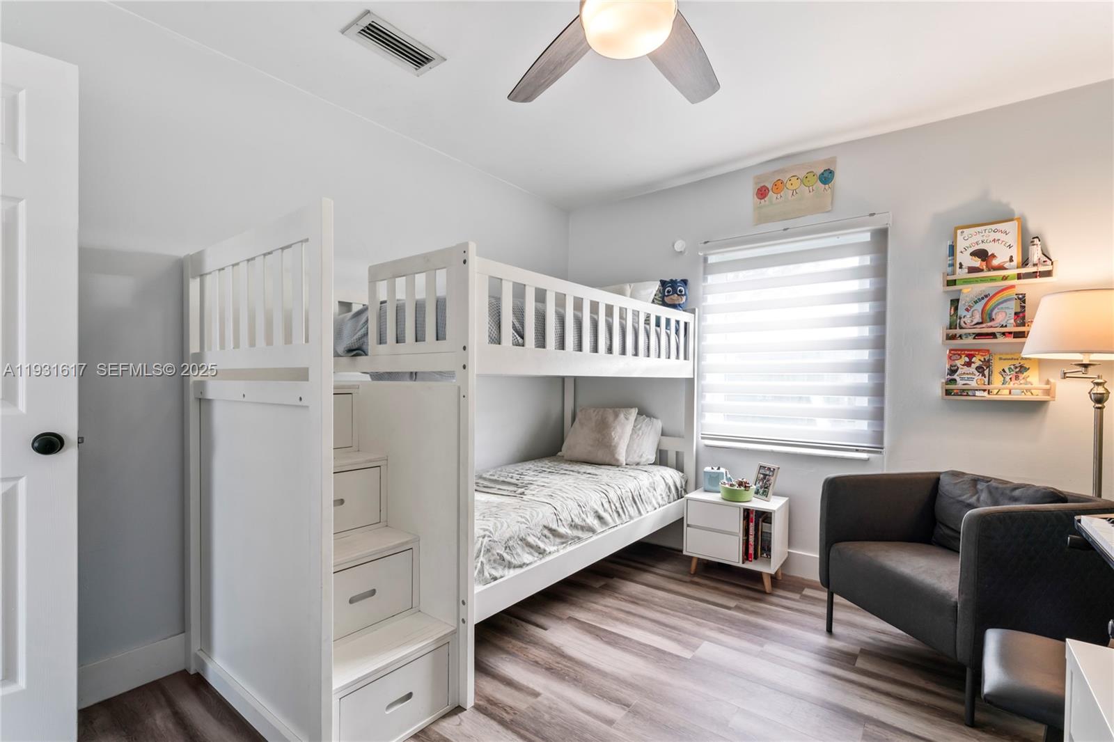 9612 Wyoming Court Boca Raton, FL 33434 - Photo 24 of 44 a bedroom with furniture and a window