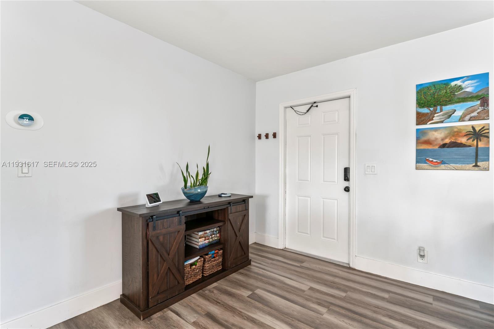 9612 Wyoming Court Boca Raton, FL 33434 - Photo 25 of 44 a view of an entryway with wooden floor