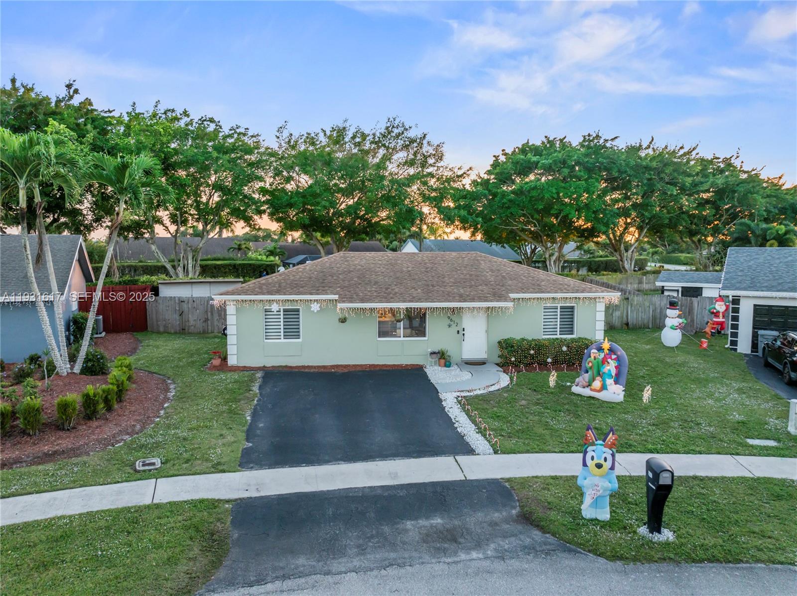 9612 Wyoming Court Boca Raton, FL 33434 - Photo 27 of 44 a house view with a garden space
