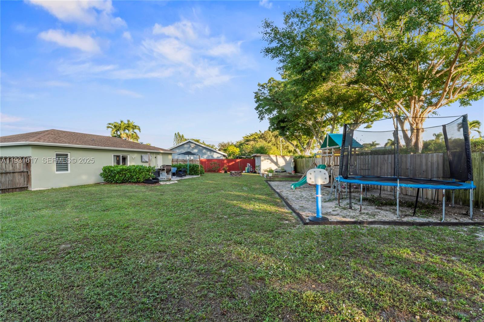 9612 Wyoming Court Boca Raton, FL 33434 - Photo 30 of 44 a view of a house with a yard