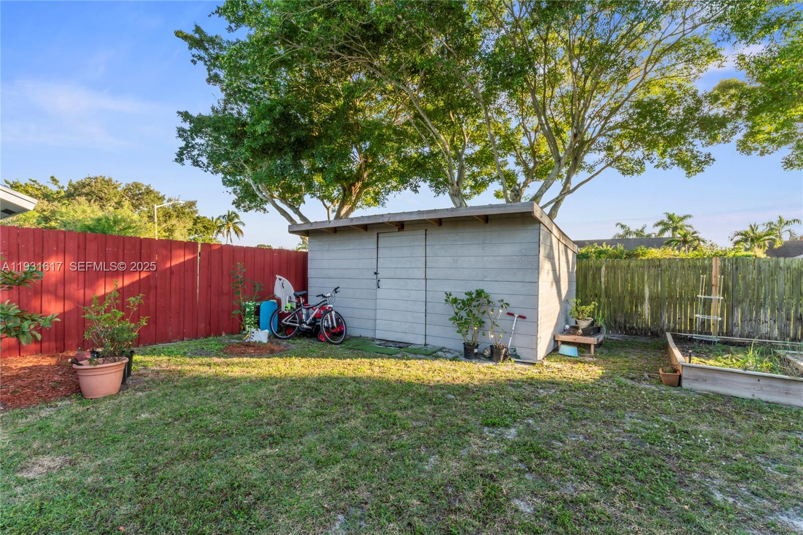 9612 Wyoming Court Boca Raton, FL 33434 - Photo 33 of 44 a front view of a house with garden