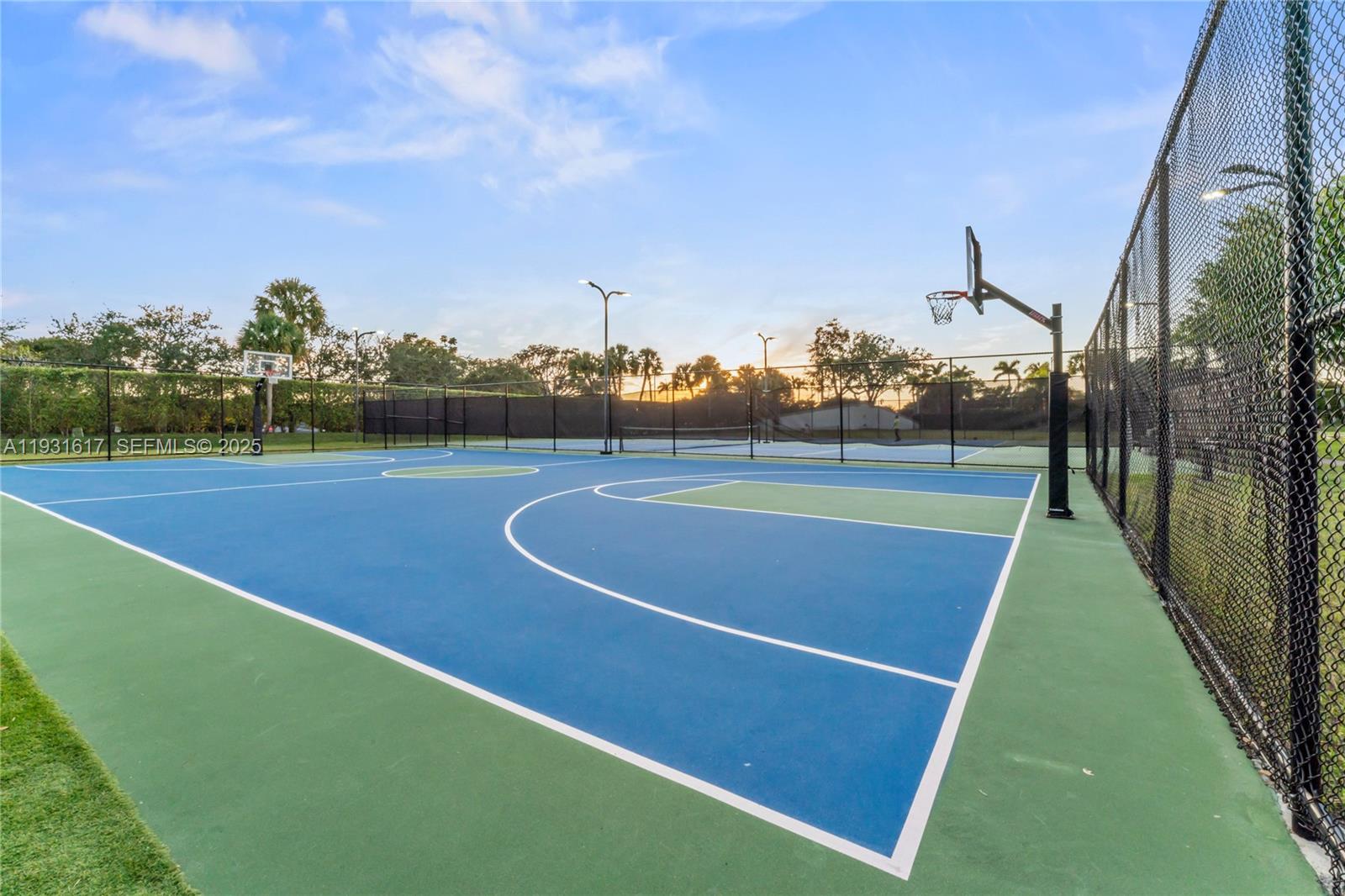 9612 Wyoming Court Boca Raton, FL 33434 - Photo 35 of 44 a view of an outdoor space and tennis court