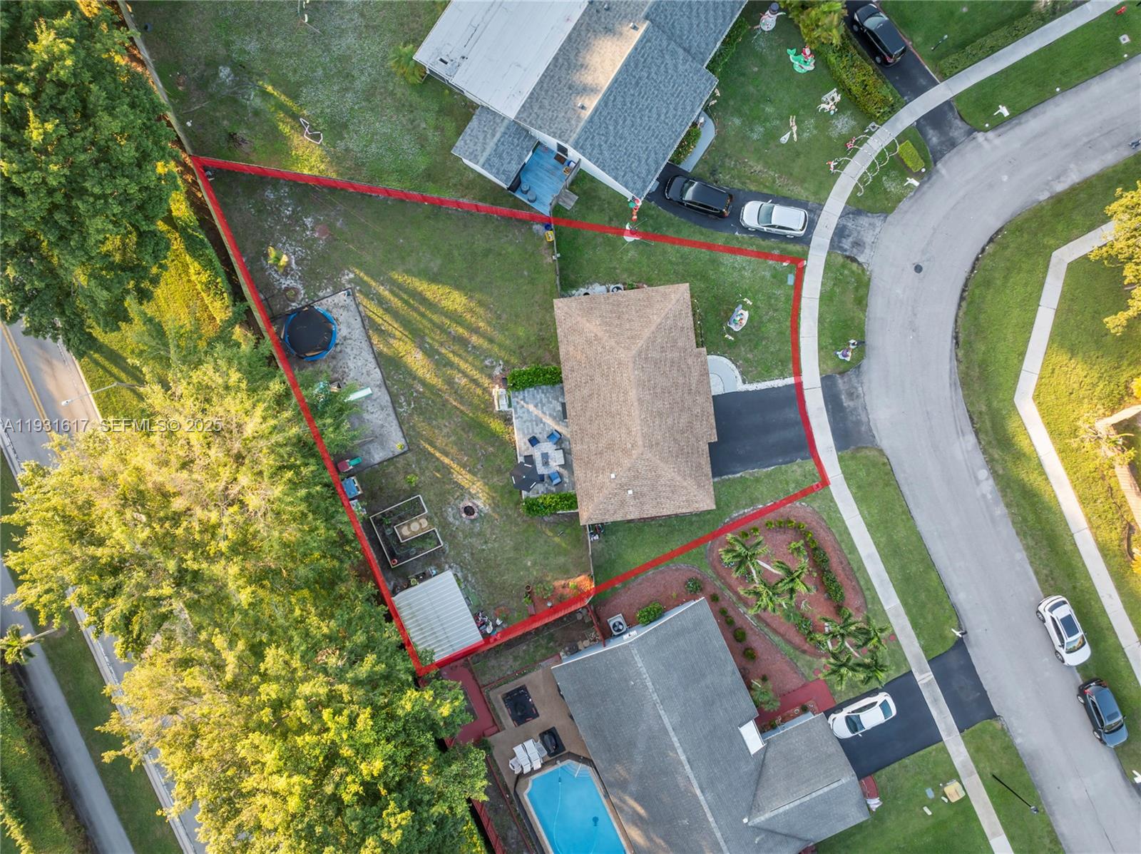 9612 Wyoming Court Boca Raton, FL 33434 - Photo 37 of 44 an aerial view of a house with a garden and swimming pool