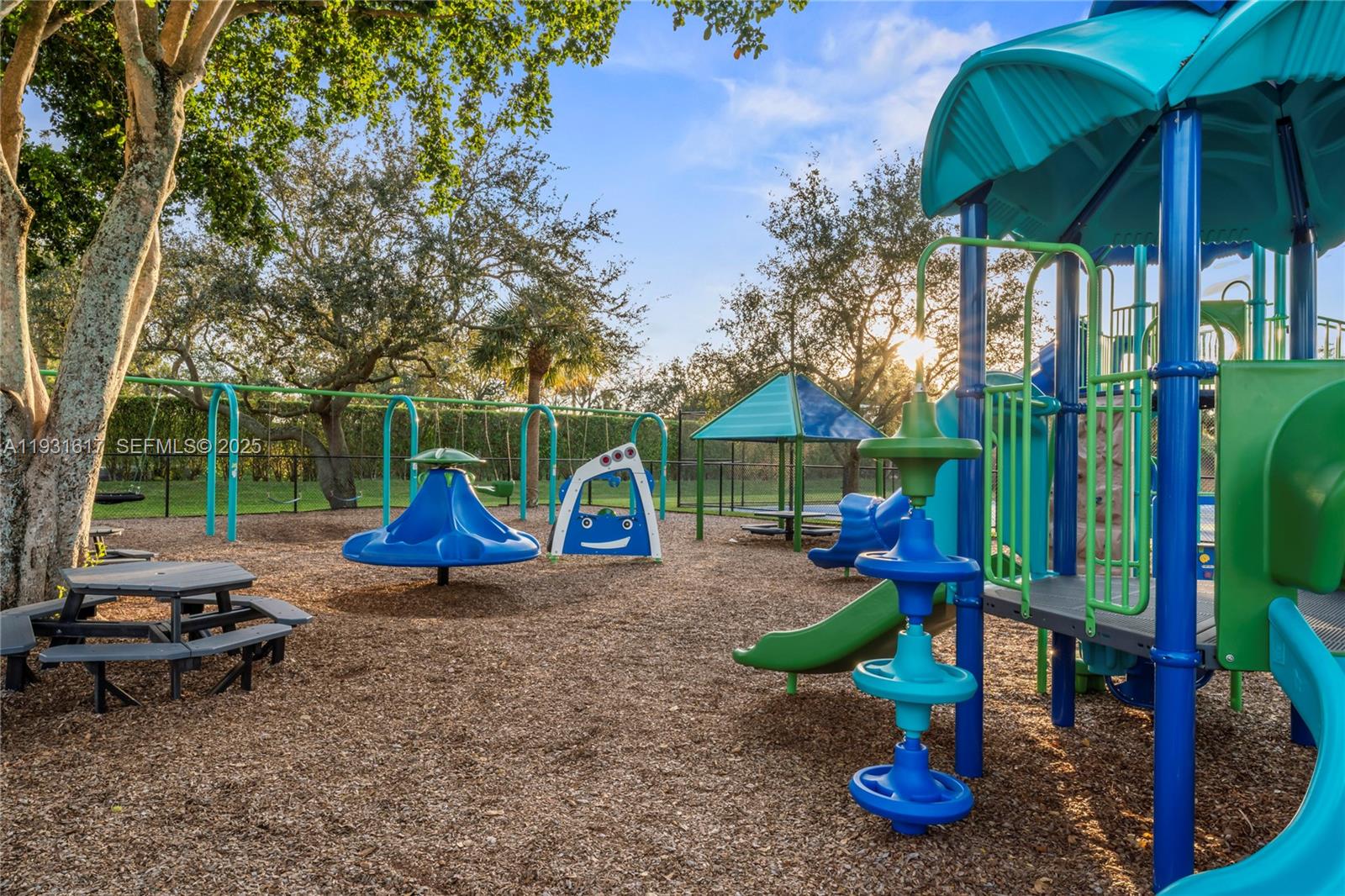 9612 Wyoming Court Boca Raton, FL 33434 - Photo 40 of 44 a view of a house with backyard and sitting area