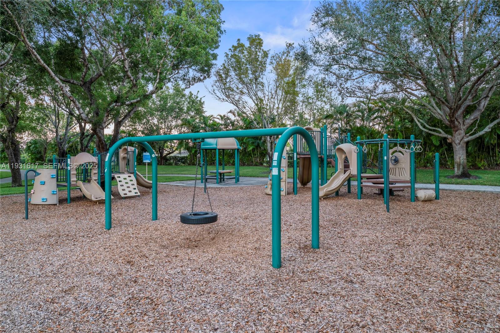 9612 Wyoming Court Boca Raton, FL 33434 - Photo 42 of 44 a view of a park with swings