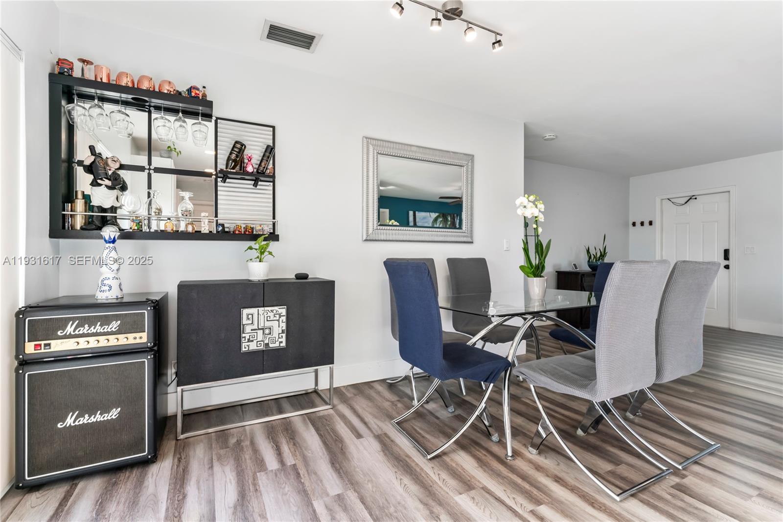 9612 Wyoming Court Boca Raton, FL 33434 - Photo 10 of 44 a view of a livingroom with furniture and a fireplace