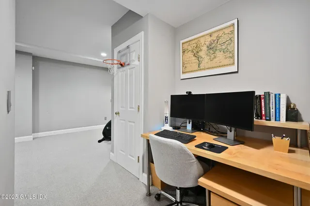 a workspace with furniture and window