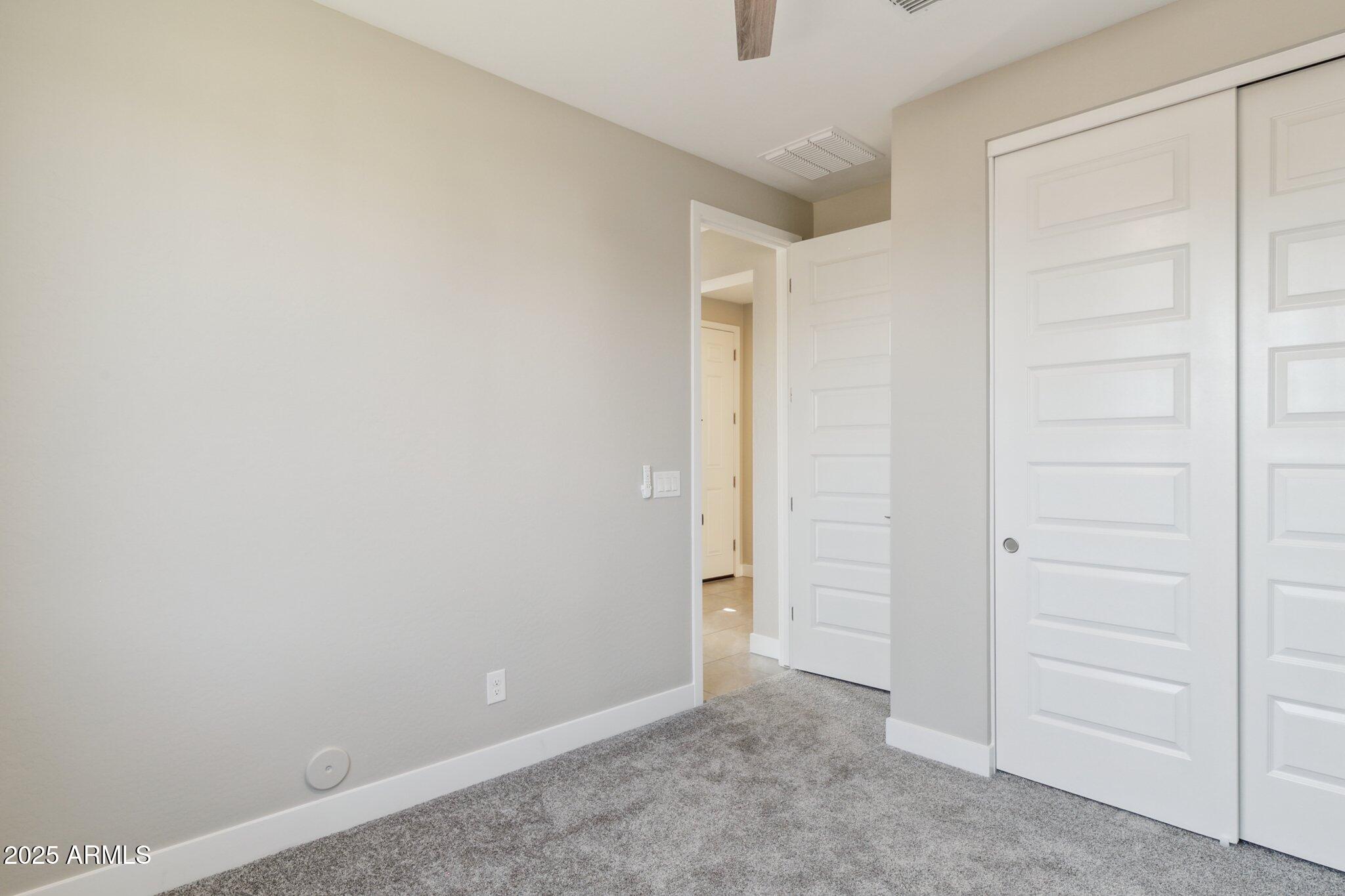 14742 West Soft Wind Drive Surprise, AZ 85387 - Photo 15 of 26 a view of an empty room