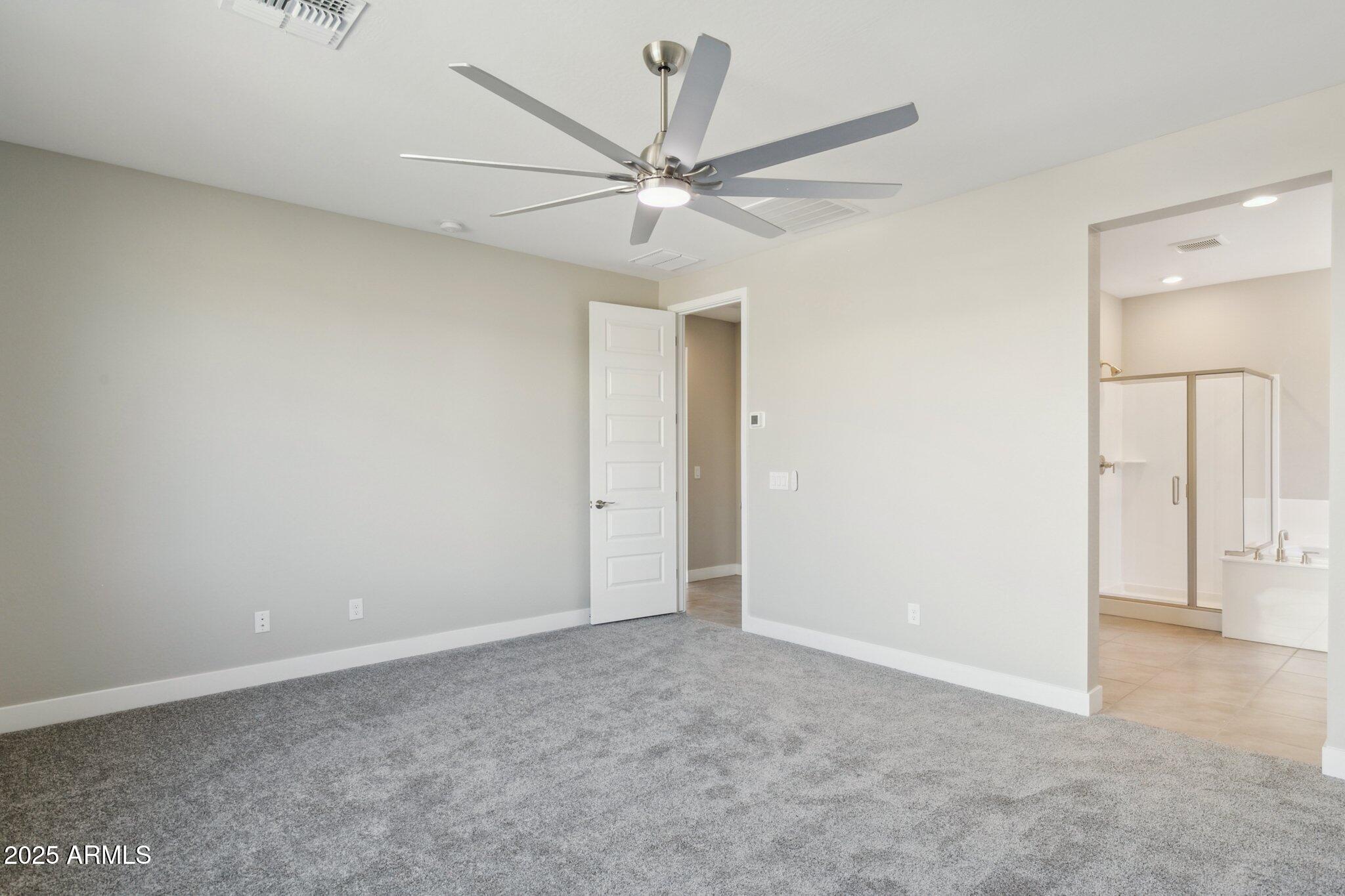 14742 West Soft Wind Drive Surprise, AZ 85387 - Photo 10 of 26 a view of an empty room