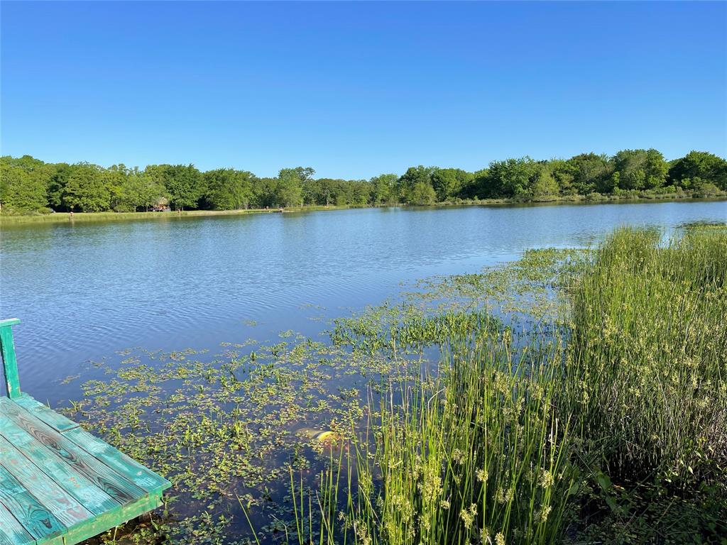 0 Rains County Road 3345 Emory, TX 75440 - Photo 5 of 18 a view of a lake with a city view