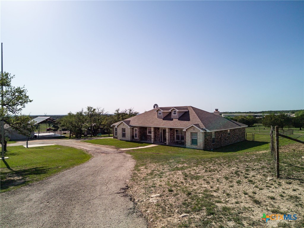 690 A County Road 4707 Kempner, TX 76539 - Photo 34 of 39 a view of a house with garden and trees