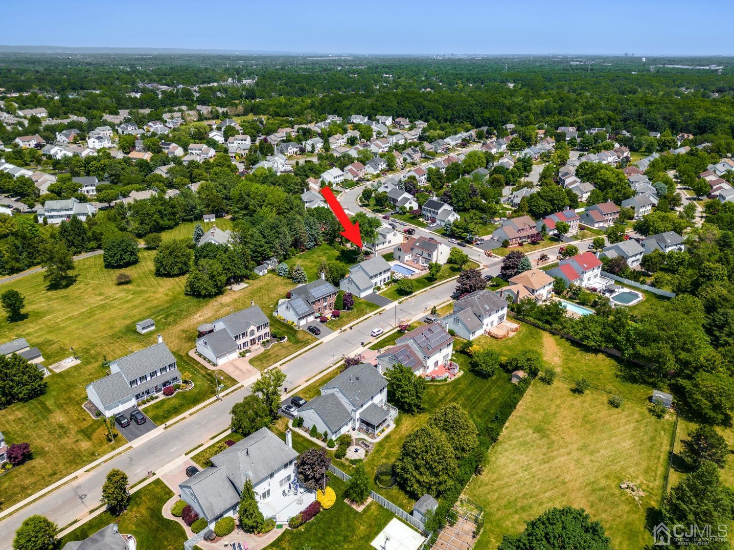 9 Dickinson Road Kendall Park, NJ 08824 - Photo 27 of 34 an aerial view of residential houses with outdoor space and trees