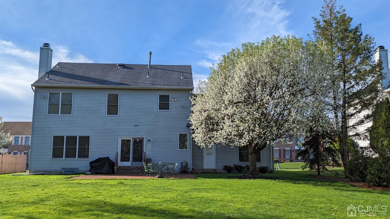 9 Dickinson Road Kendall Park, NJ 08824 - Photo 33 of 34 a front view of house with yard