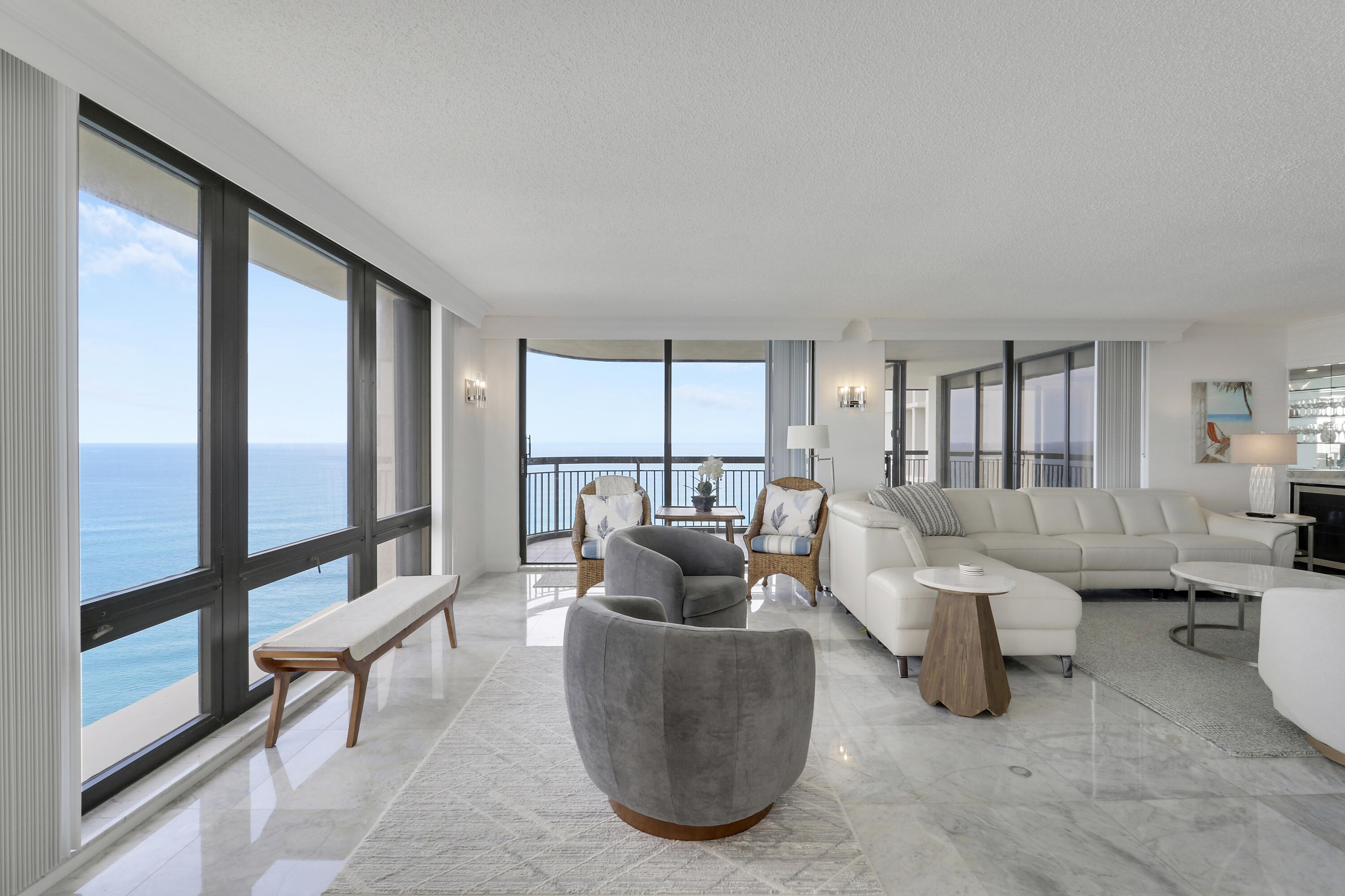 5380 North Ocean Drive, Unit 22J Riviera Beach, FL 33404 - Photo 12 of 53 a living room with furniture and a large window