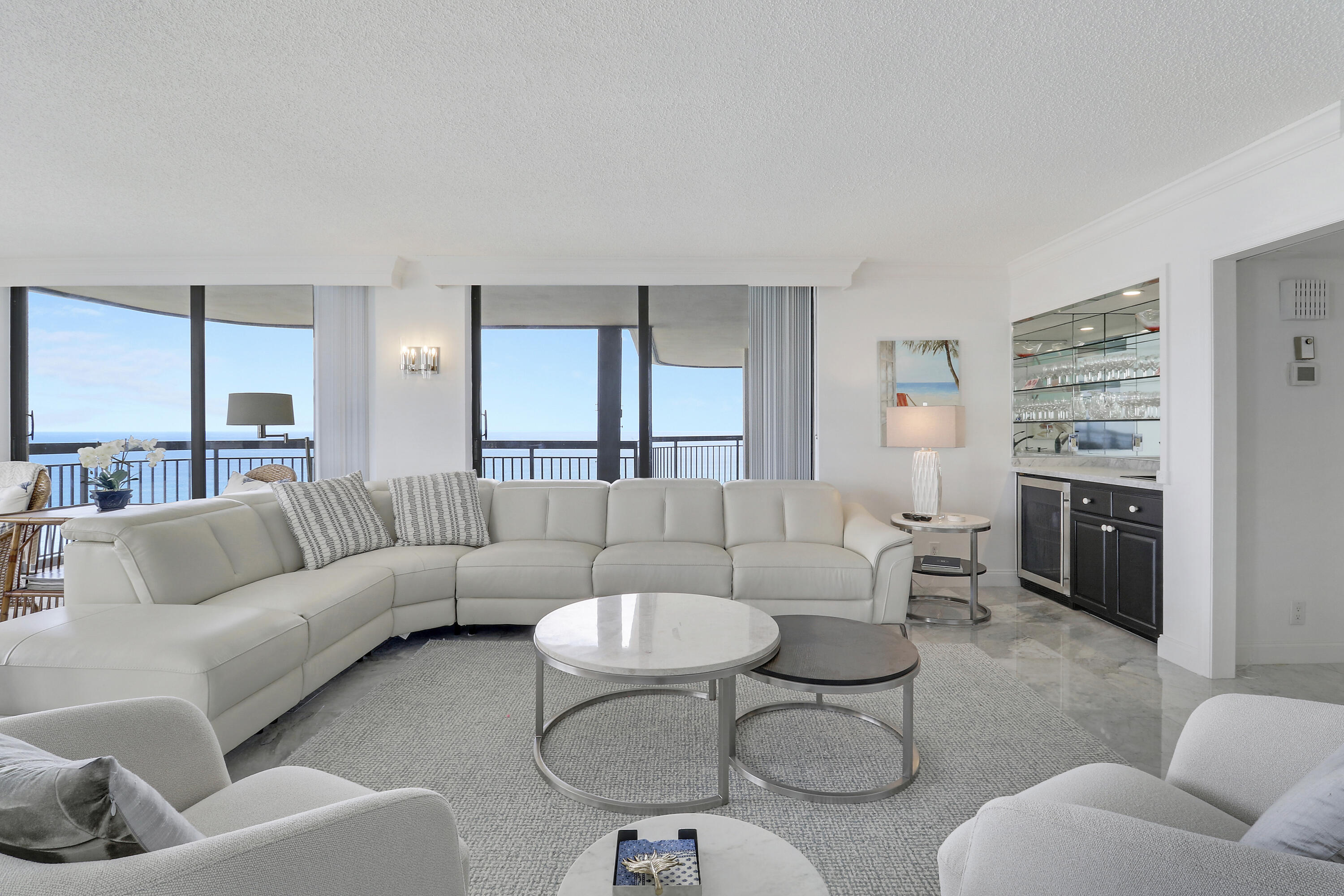 5380 North Ocean Drive, Unit 22J Riviera Beach, FL 33404 - Photo 13 of 53 a living room with furniture and a large window