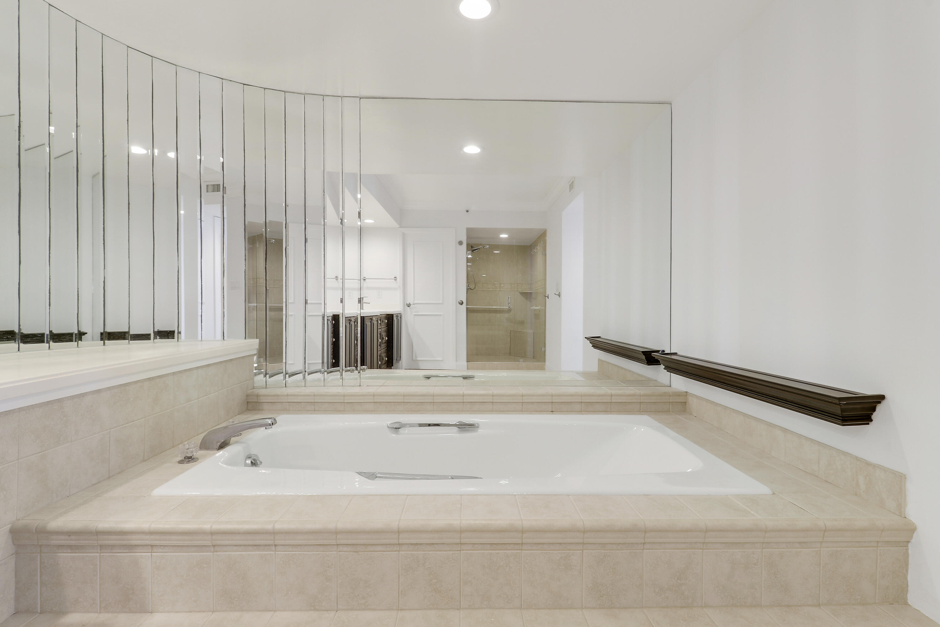 5380 North Ocean Drive, Unit 22J Riviera Beach, FL 33404 - Photo 29 of 53 a bathroom with a bathtub and a sink