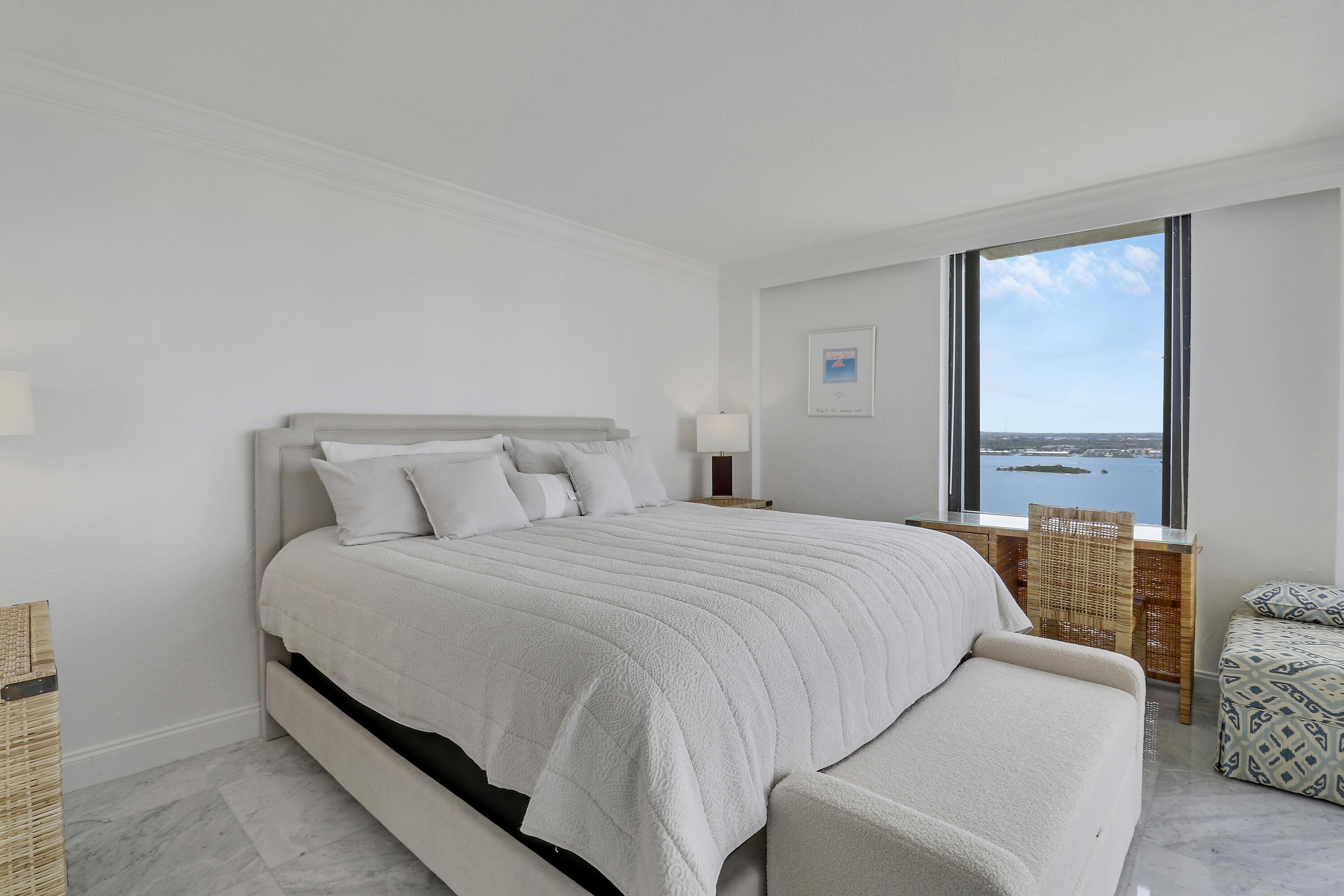 5380 North Ocean Drive, Unit 22J Riviera Beach, FL 33404 - Photo 37 of 53 a bedroom with bed and a large window