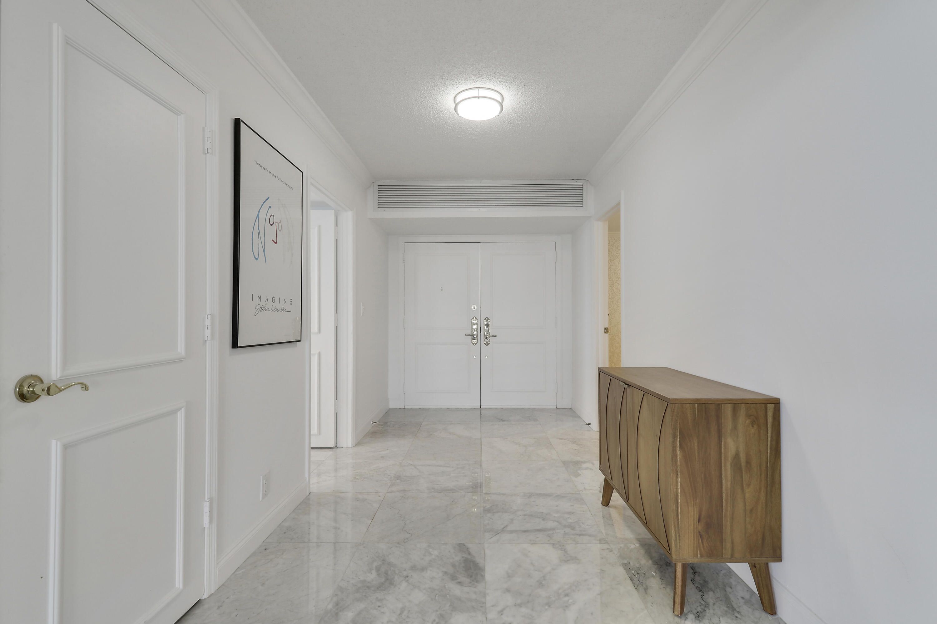 5380 North Ocean Drive, Unit 22J Riviera Beach, FL 33404 - Photo 4 of 53 a view of a hallway