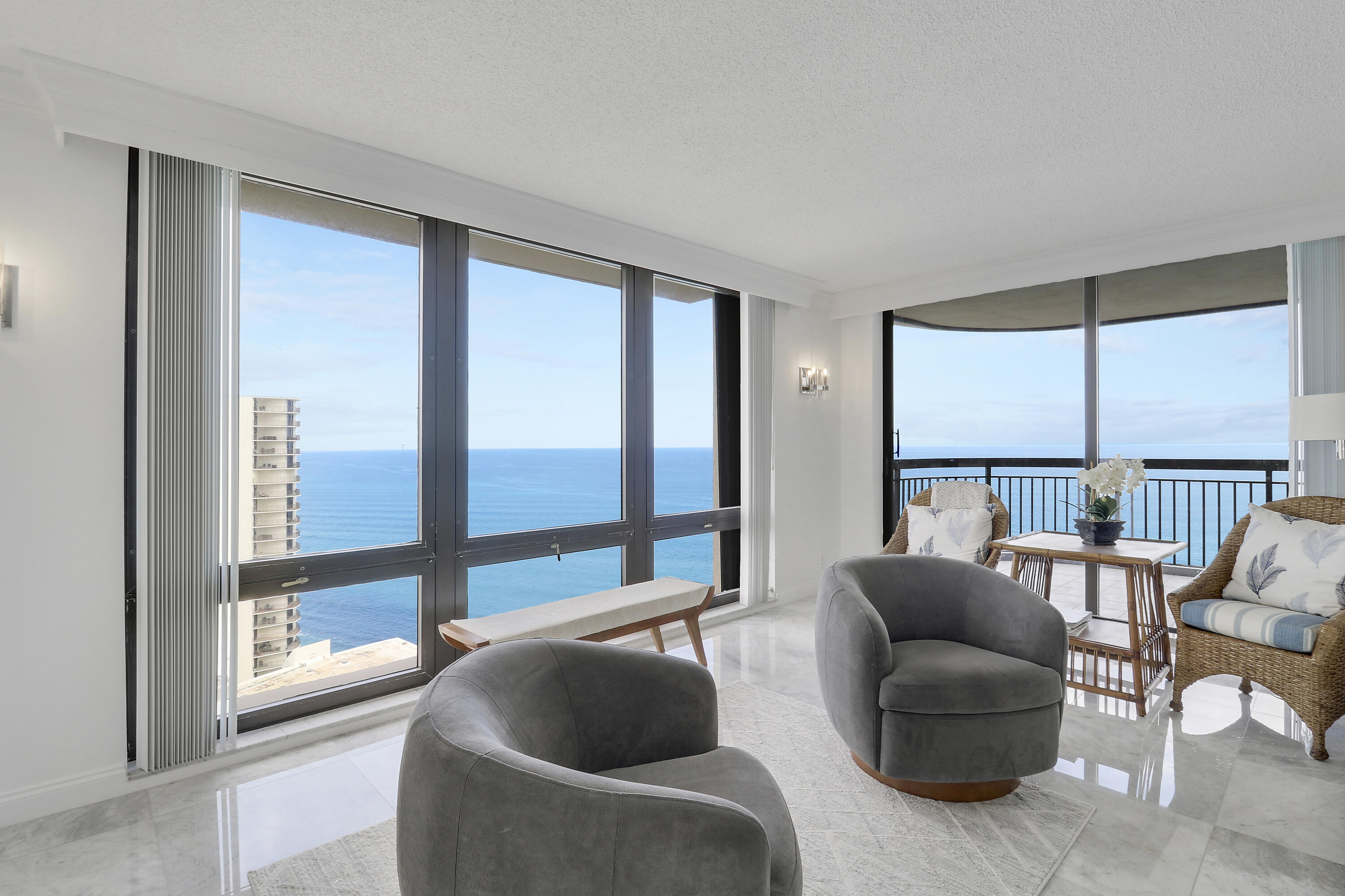 5380 North Ocean Drive, Unit 22J Riviera Beach, FL 33404 - Photo 7 of 53 a living room with furniture and a large window