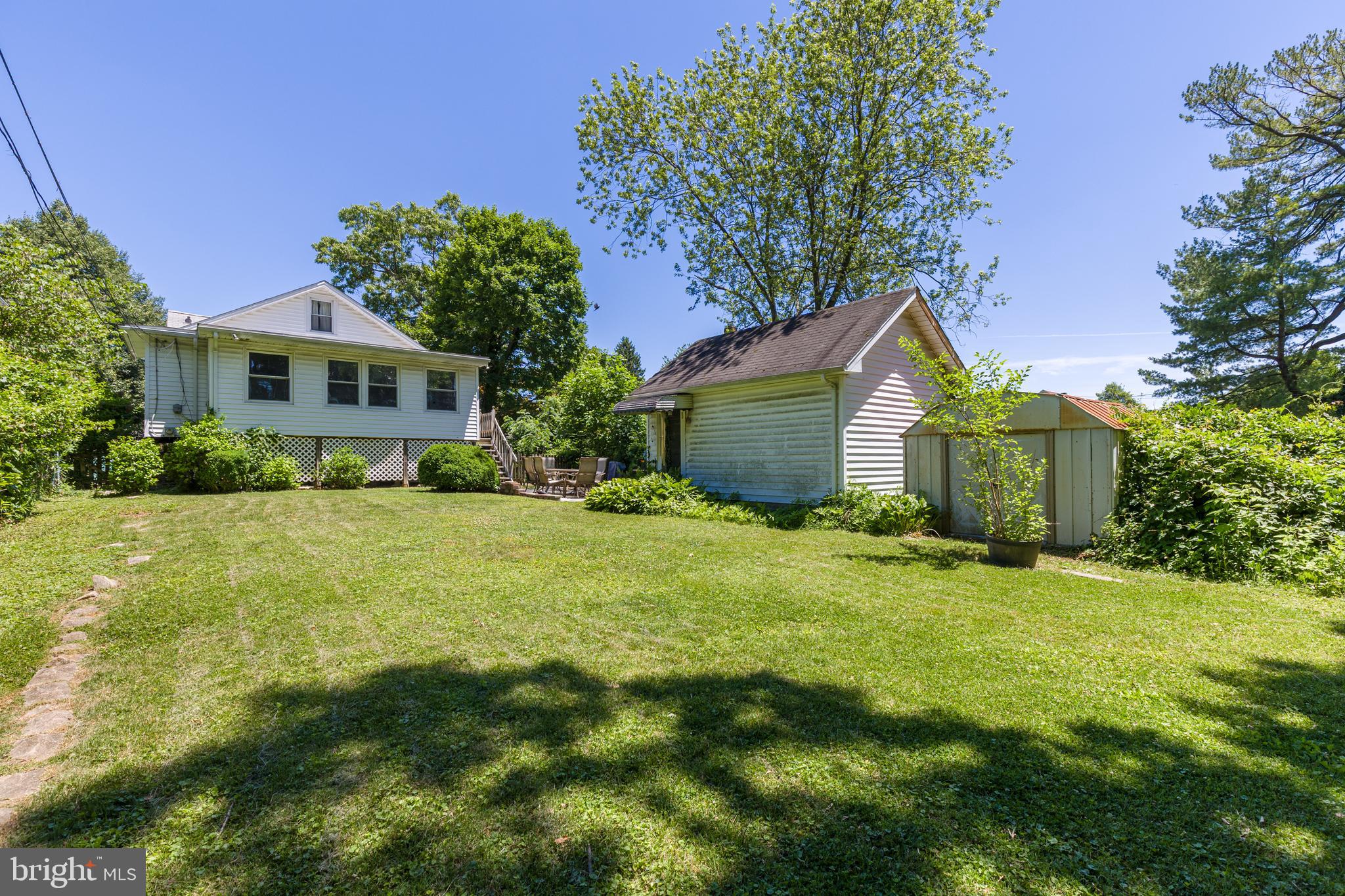 6426 Sherwood Road Baltimore, MD 21239 - Photo 41 of 43 a front view of house with yard and green space