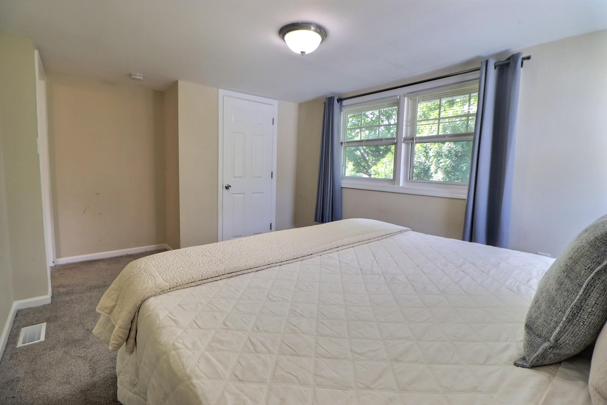 67 Walnut Street Woodbury, NJ 08096 - Photo 16 of 23 Large, bright and welcoming primary bedroom.