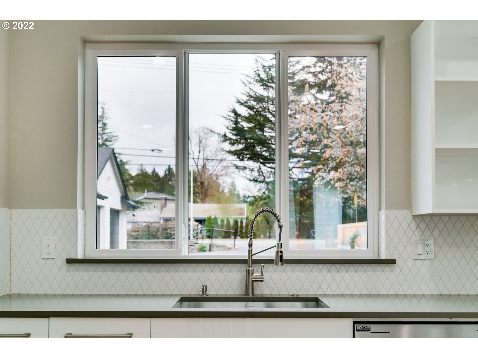7975 Southwest Oleson Road Portland, OR 97223 - Photo 12 of 32 a view of a window in a house
