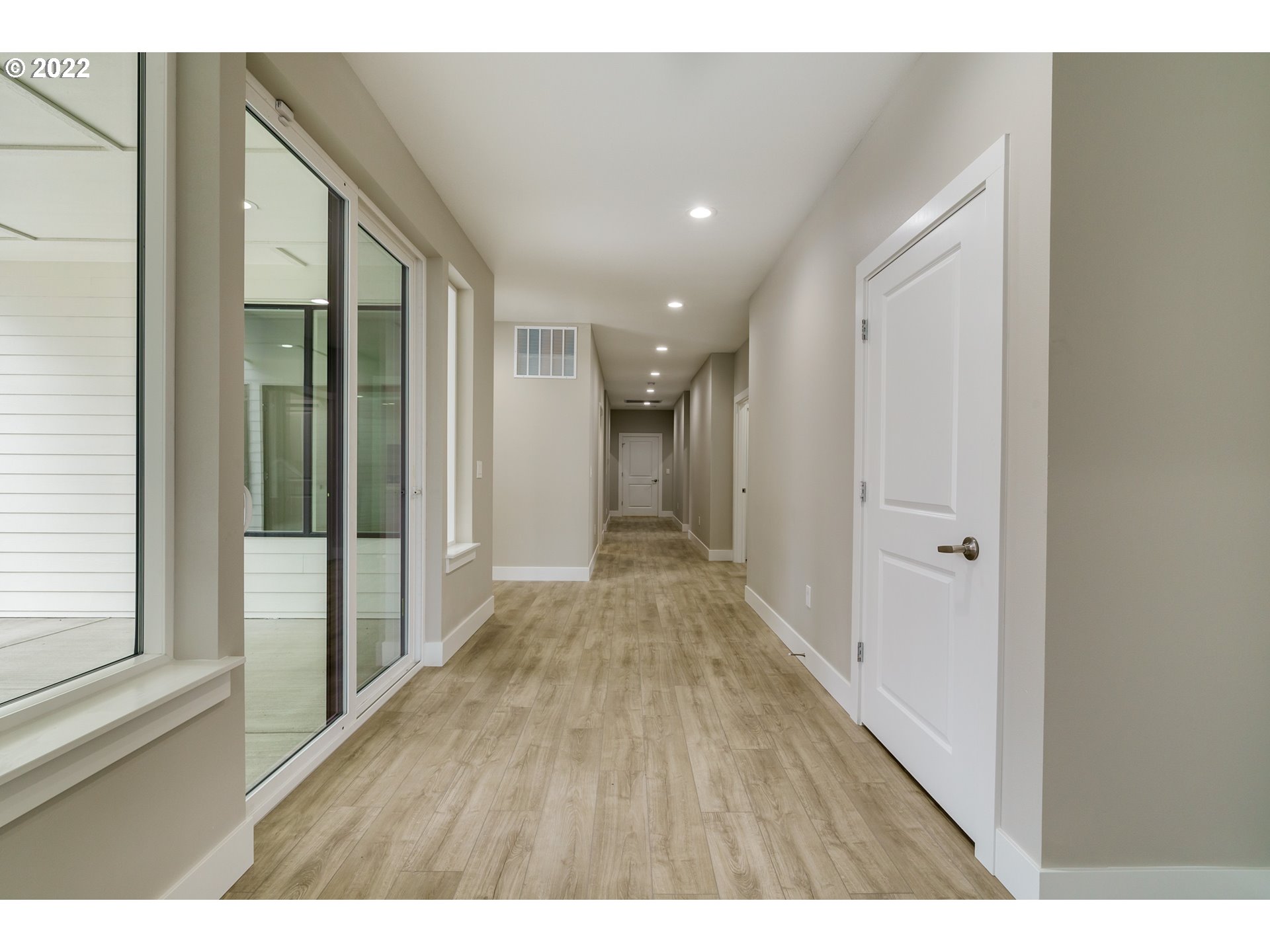 7975 Southwest Oleson Road Portland, OR 97223 - Photo 14 of 32 a view of hallway with wooden floor