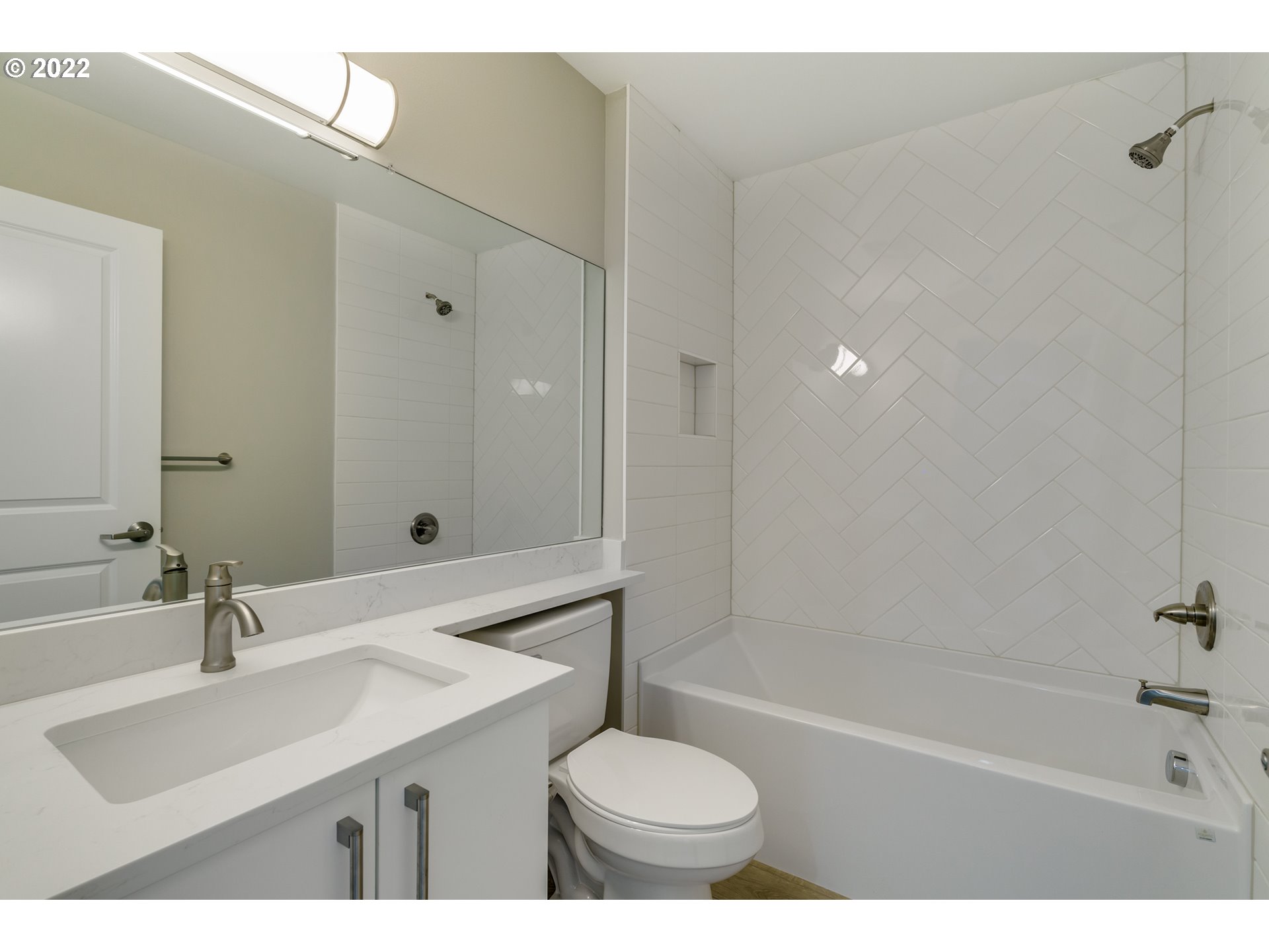 7975 Southwest Oleson Road Portland, OR 97223 - Photo 31 of 32 a bathroom with a sink shower bathtub and a toilet