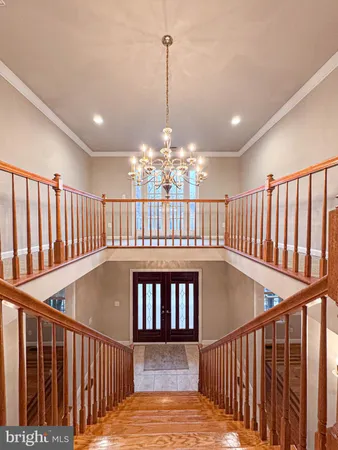 a view of an chairs in wooden floor