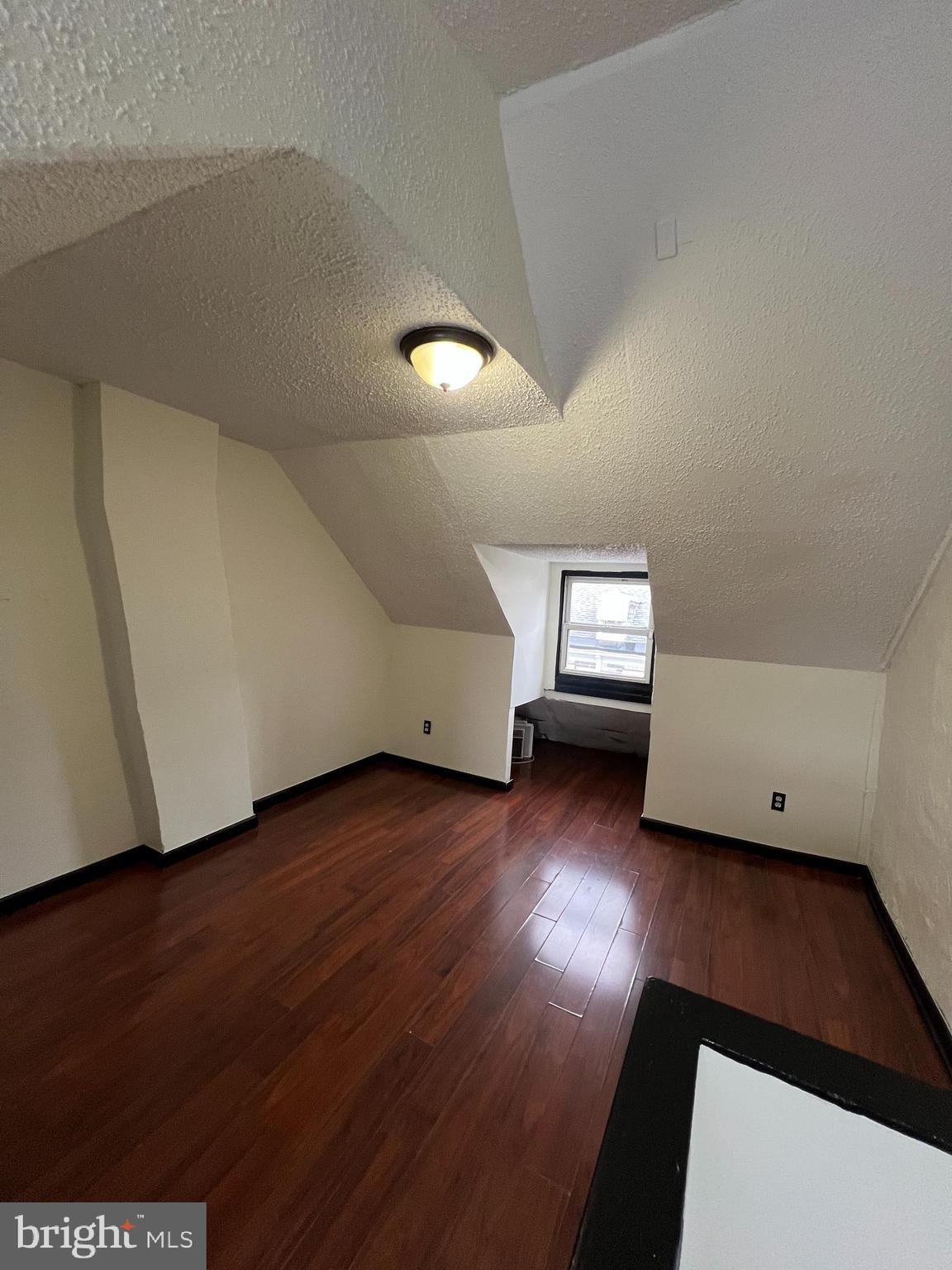 434 Birch Street Reading, PA 19604 - Photo 17 of 21 a view of an empty room and window