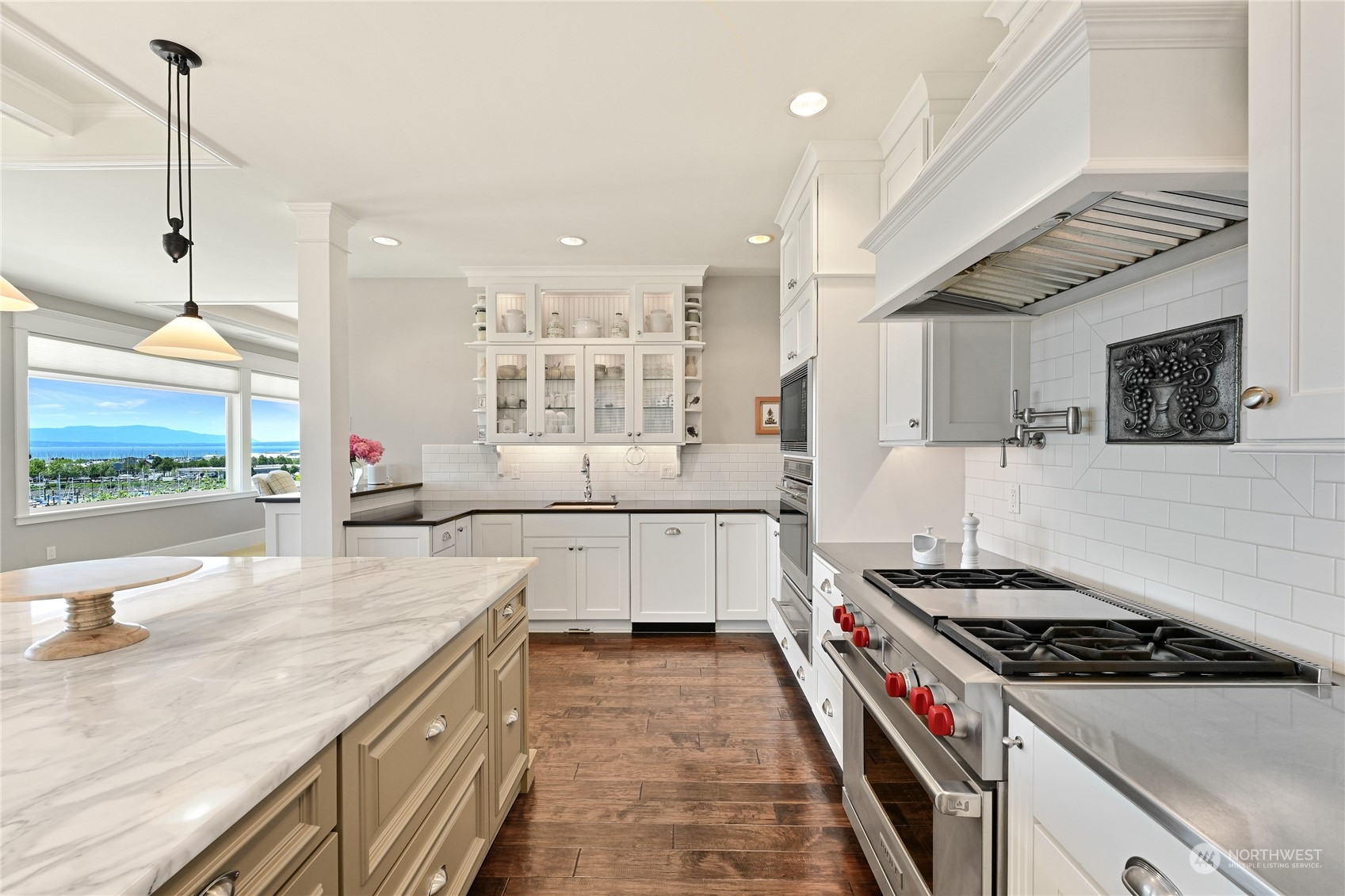 2015 Eldridge Avenue Bellingham, WA 98225 - Photo 16 of 40 a kitchen with stainless steel appliances granite countertop a stove and a sink