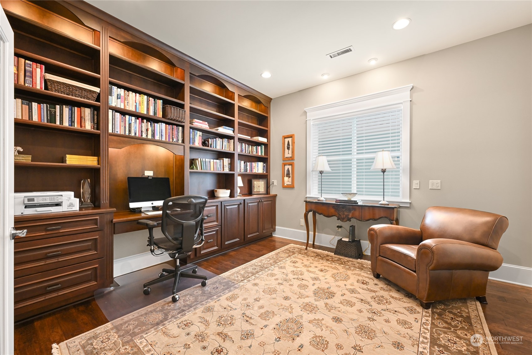 2015 Eldridge Avenue Bellingham, WA 98225 - Photo 26 of 40 a work room with furniture lamp and book shelf