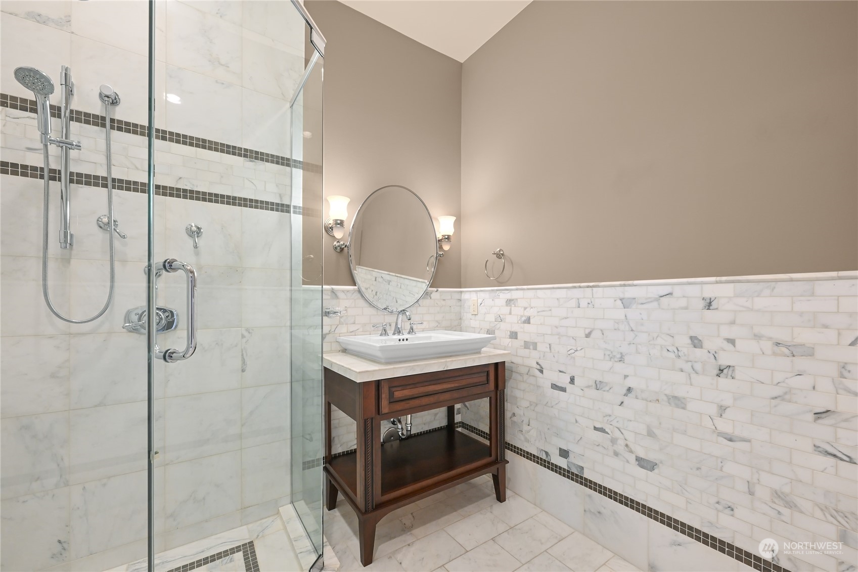 2015 Eldridge Avenue Bellingham, WA 98225 - Photo 28 of 40 a bathroom with a sink a vanity and shower