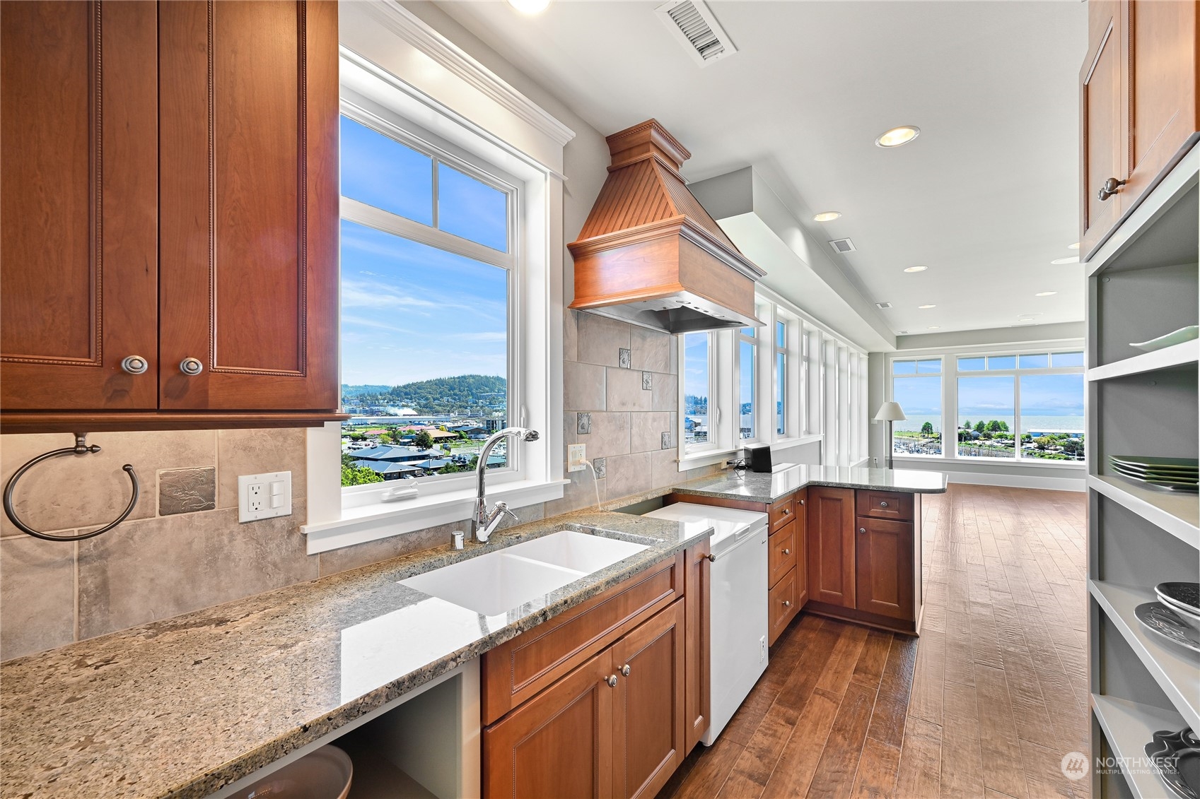 2015 Eldridge Avenue Bellingham, WA 98225 - Photo 30 of 40 a kitchen with a sink stove top oven and cabinets